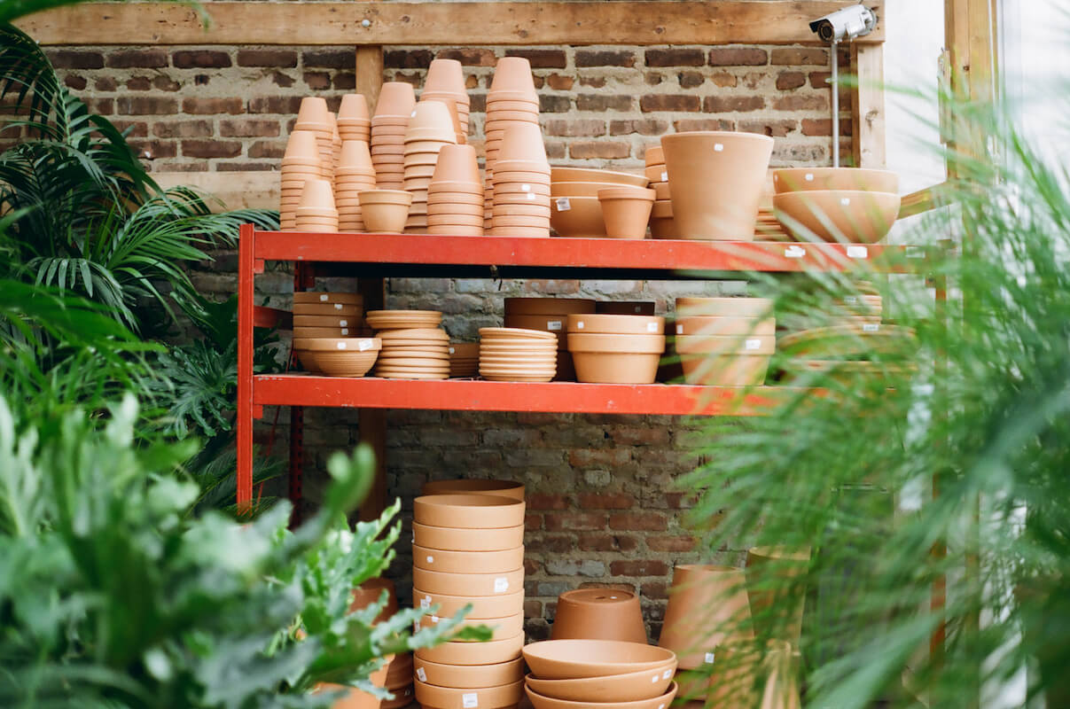 A shelf filled with clay pots - The Small Business Owner's Guide to Financial Ratios