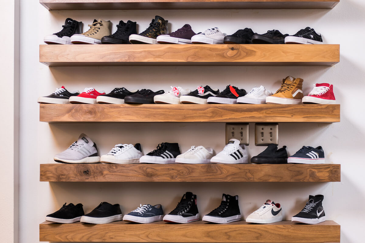 A shelf filled with shoes - How to Build a Budget for Your Small Business