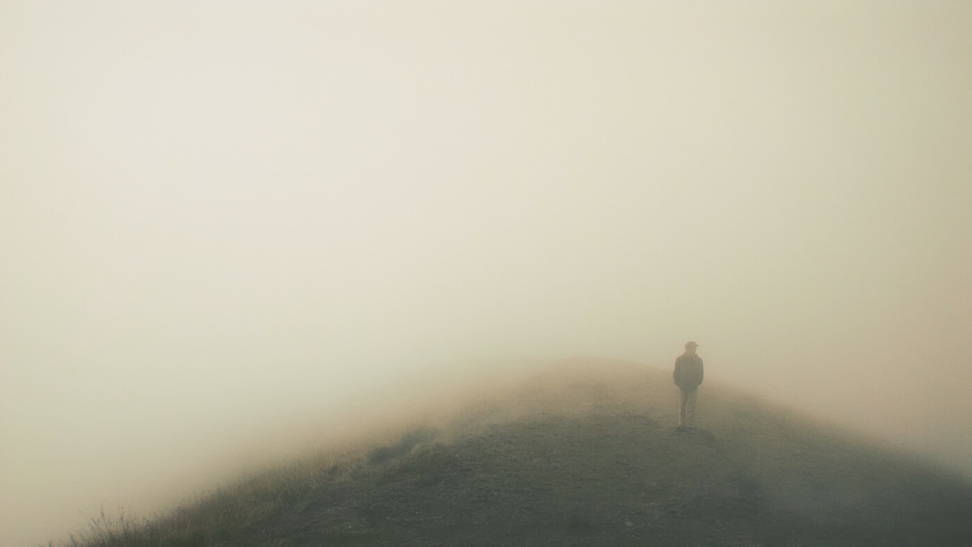 A man walking in the fog - 5 Simple Steps You Can Take to Avoid Burnout