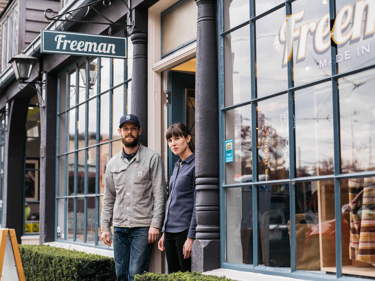 A picture of the owners of the Freeman Clothing store - Saving for a Rainy Day